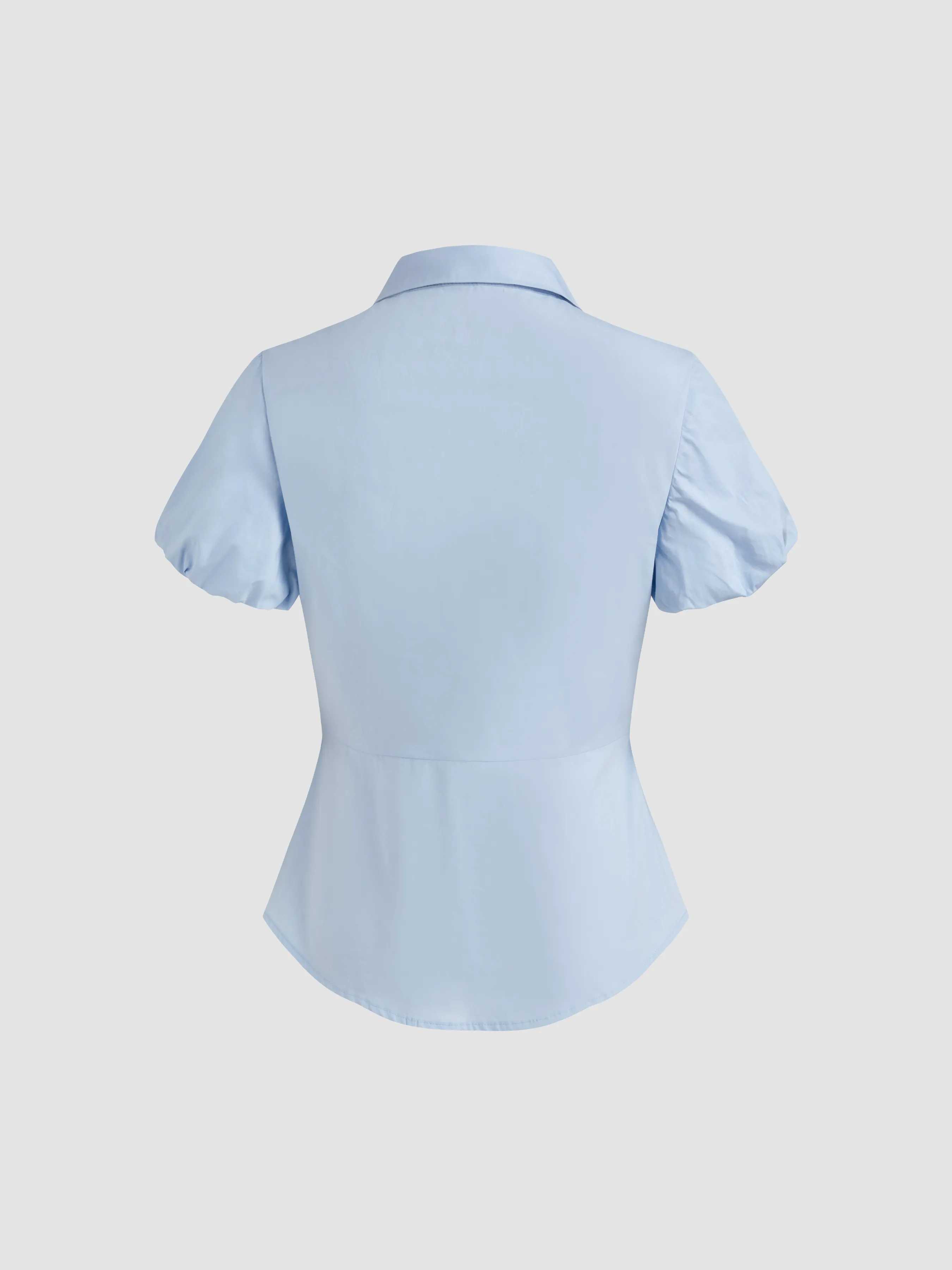 Camisa sólida con botones y manga abullonada