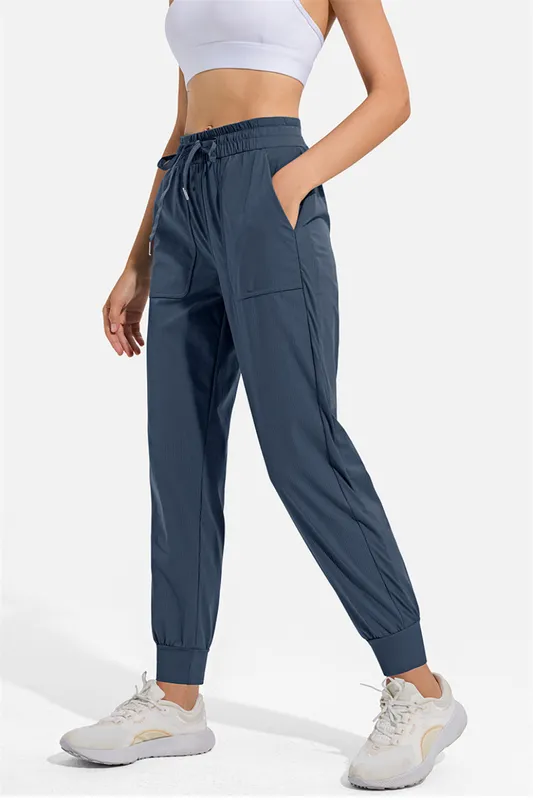 Mujeres Joggando Yoga Nenavo Pantallas Fitness de bolsillo Leggings para mujer Soft cintura alta Levante de cadera elástica Pant