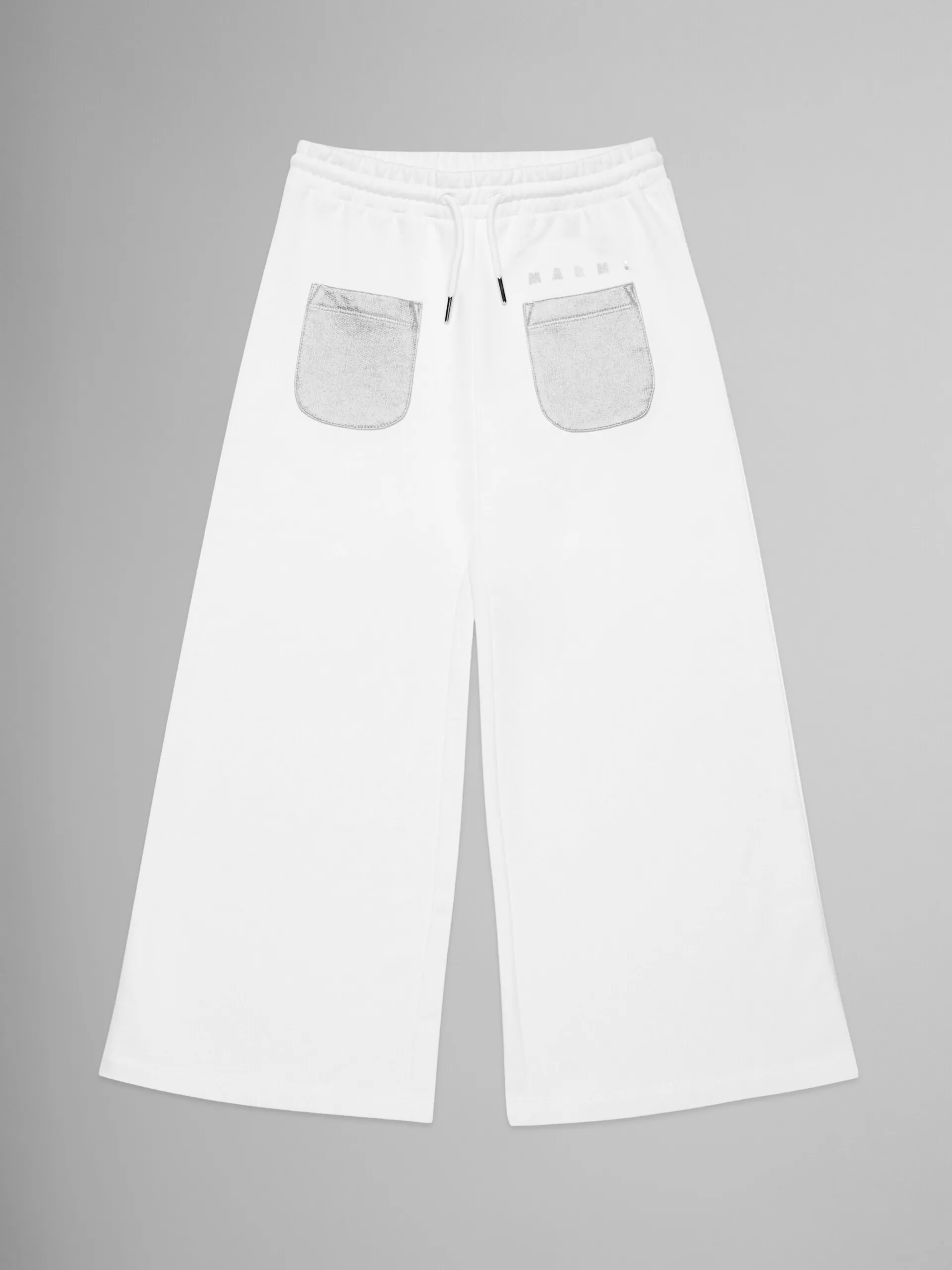 Pantalones anchos blancos de felpa con bolsillos