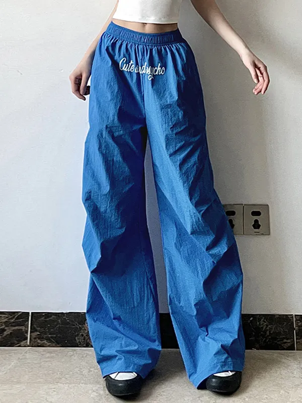 Pantalones anchos con estampado de letras