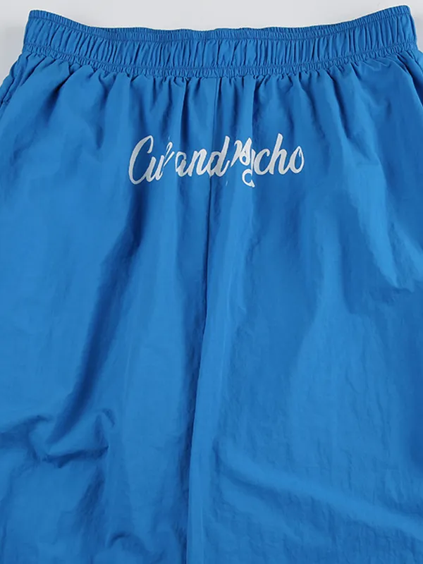 Pantalones anchos con estampado de letras