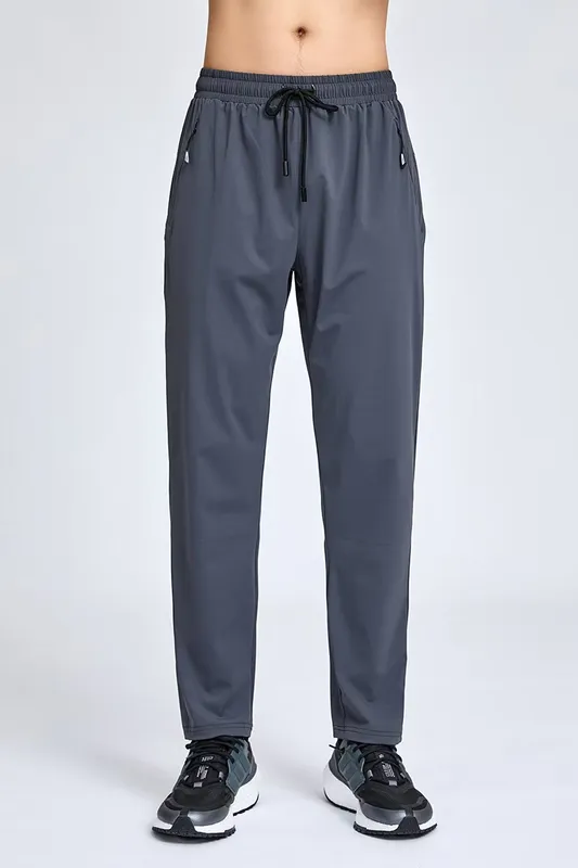 Pantalones de primavera y otoño sueltas de los deportes masculinos, entrenamiento con pantalones casuales, pantalones de protecc