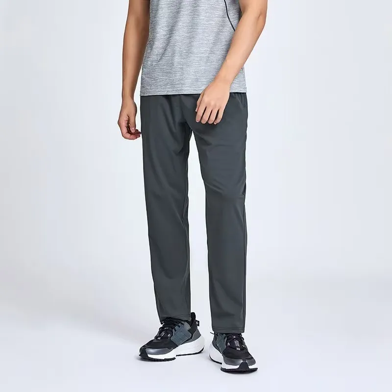 Pantalones de primavera y otoño sueltas de los deportes masculinos, entrenamiento con pantalones casuales, pantalones de protecc